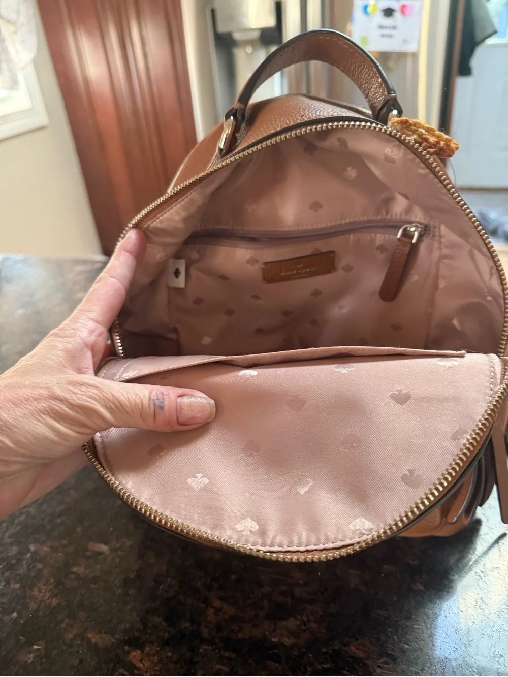 kate spade Brown Pebbled Leather Mini Backpack